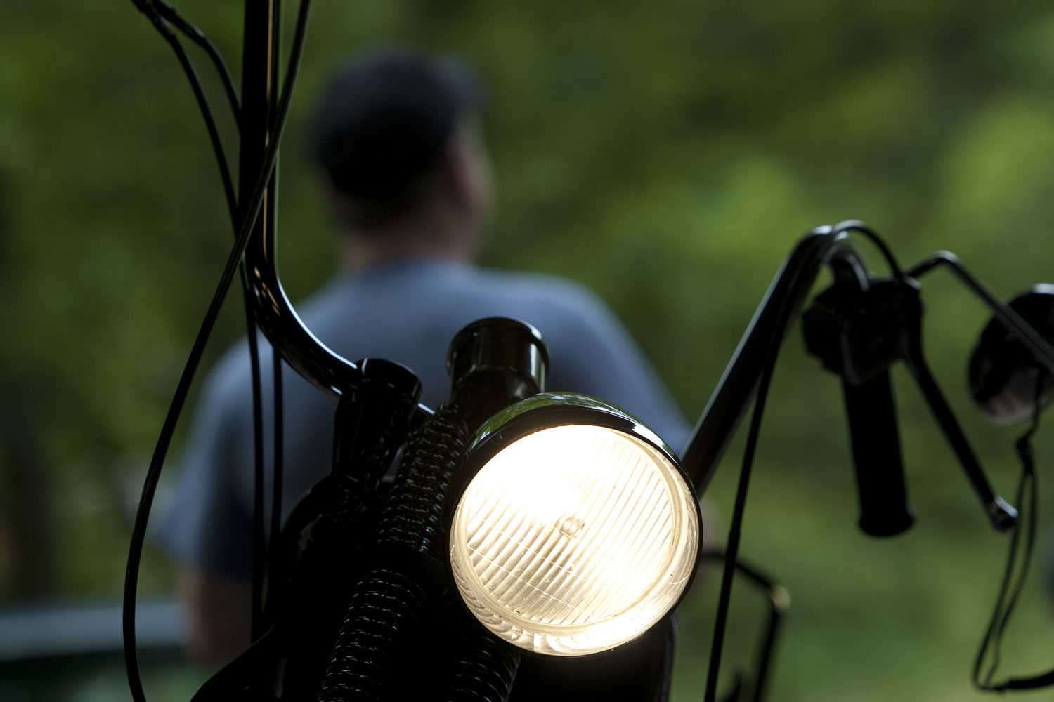 A motorcycle with its light on