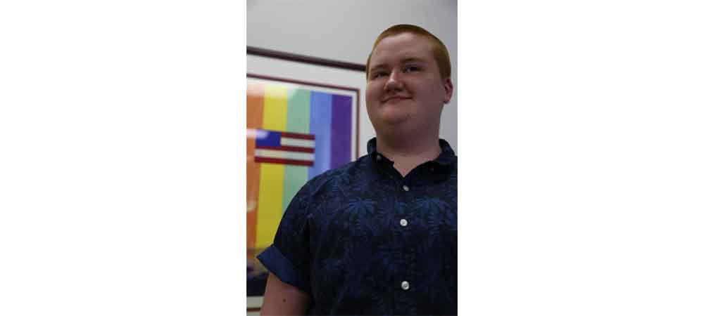 Theo waits for the start of the biweekly youth group meeting at OUTright Youth. “I try to
make myself open, and if there’s a new person I’ll usually try and talk to them for at least a
couple minutes,” he says. “I try to be as myself as possible, and encourage other people to do the same.” He continues, “When they’re just questioning in general, I want to encourage that, because questioning is how you get to the finish line.”