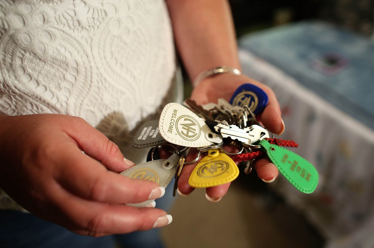 Catie Brown shows her large collection of Narcotics Anonymous Chips.