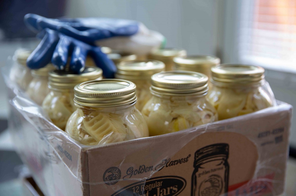 Among the 4 largest Hmong communities in United States, North Carolina is the only place that has the climate to plant bamboo. Every spring, Yang harvest the bamboo shoots, cook it, canned it and mail it to his relatives around the United States.