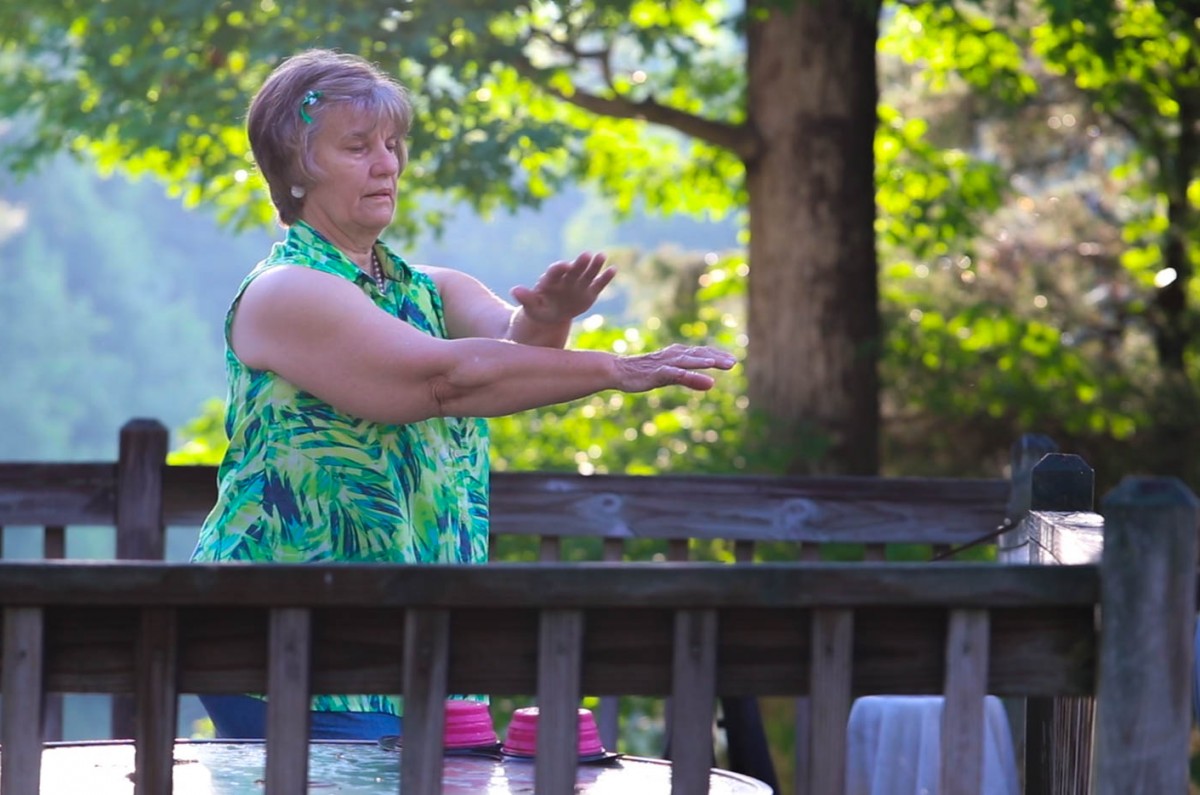 Mary practices tai chi every morning before 8 am on her back porch.