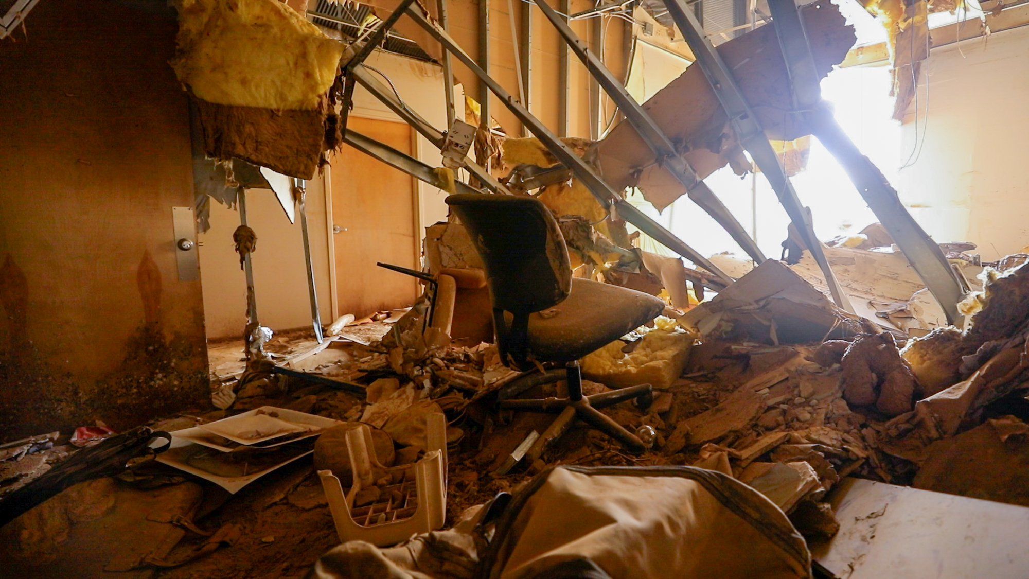 This office, once a mental health resource center, now lies completely destroyed in the storm’s aftermath. “We had never faced this before,” says Leslie Beninato, reflecting on the confusion and helplessness left in the hurricane’s wake.