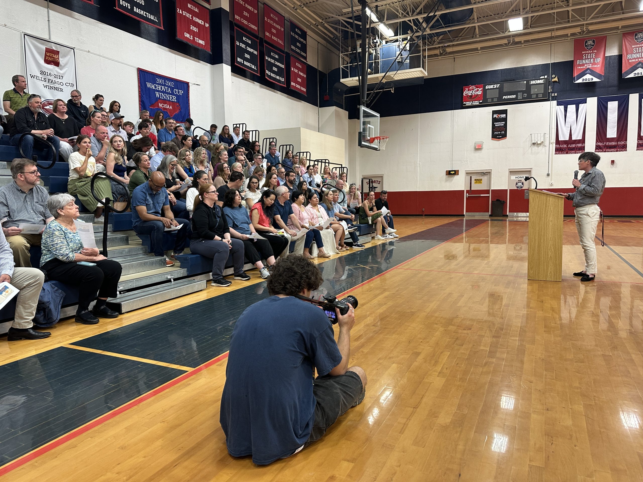 Nick filming at the school assembly.