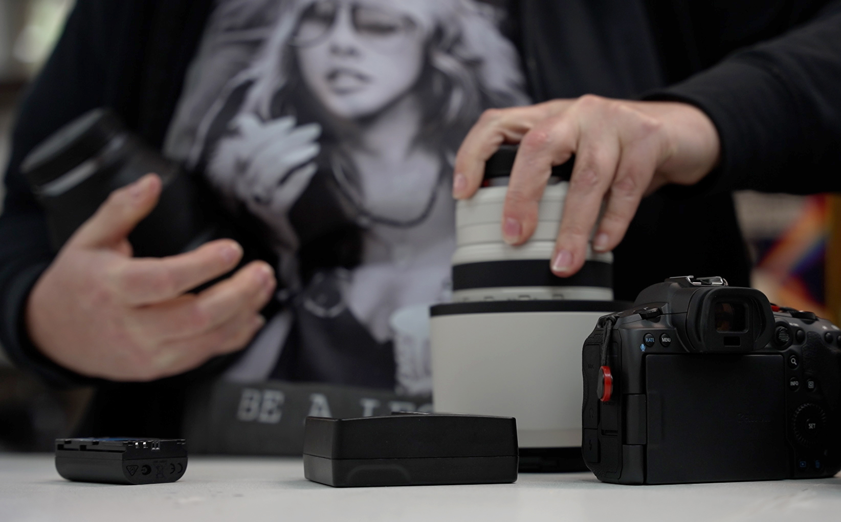 Fumberg organizes her equipment in preparation for a photoshoot with her assistant. She said investing in her passion and business, including obtaining quality equipment, produces the best work.