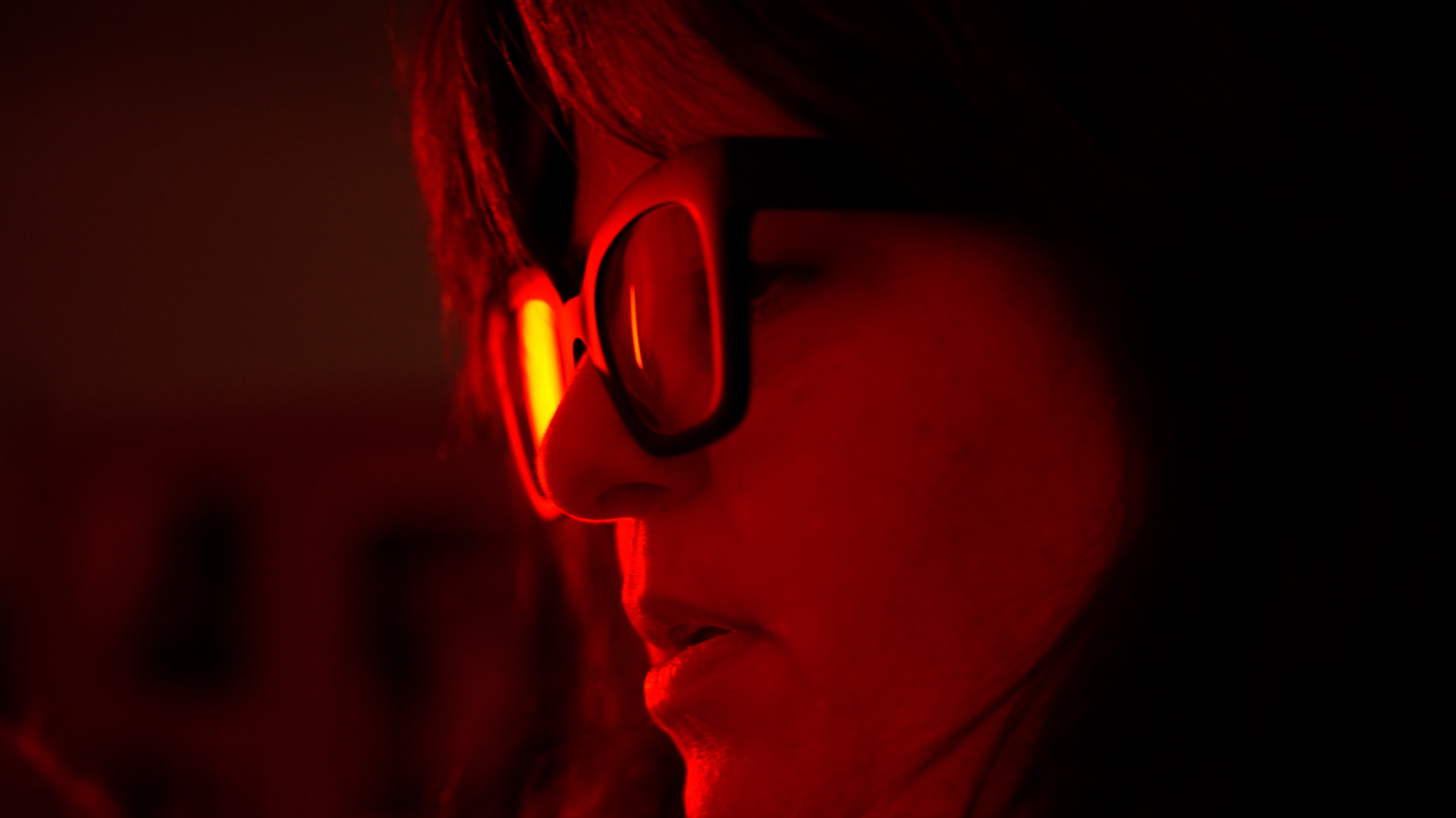 Fumberg frames her model while adjusting her camera settings. She said the best part about having a lot of equipment, and her own studio, is having the ability to be creative.