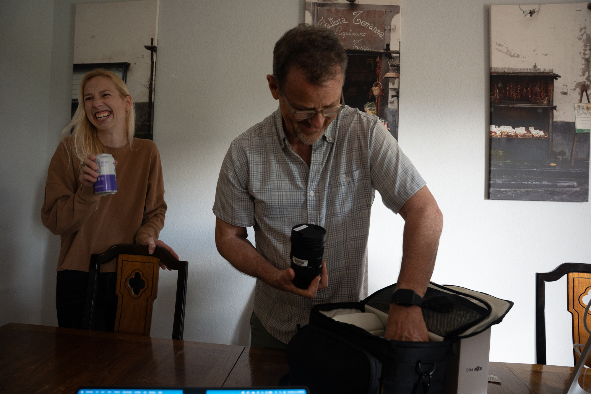 Tegan Conner and Pat Davison shared a moment of laughter about setting up the camera equipment in the basement of the CPJW 2025 house.