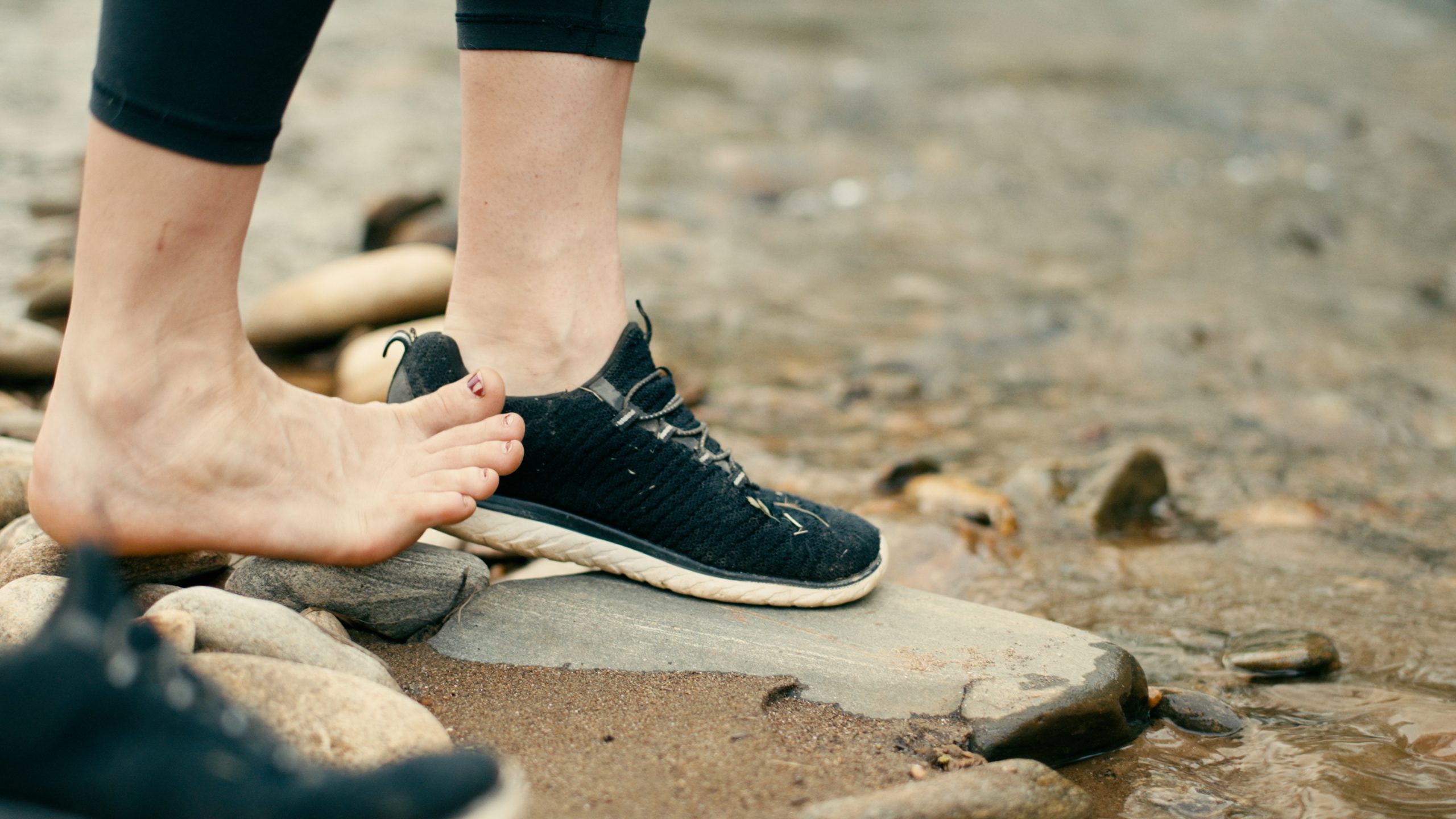 Blair prepares to dip her feet into the river. “This is the furthest I’ve been able to go.”