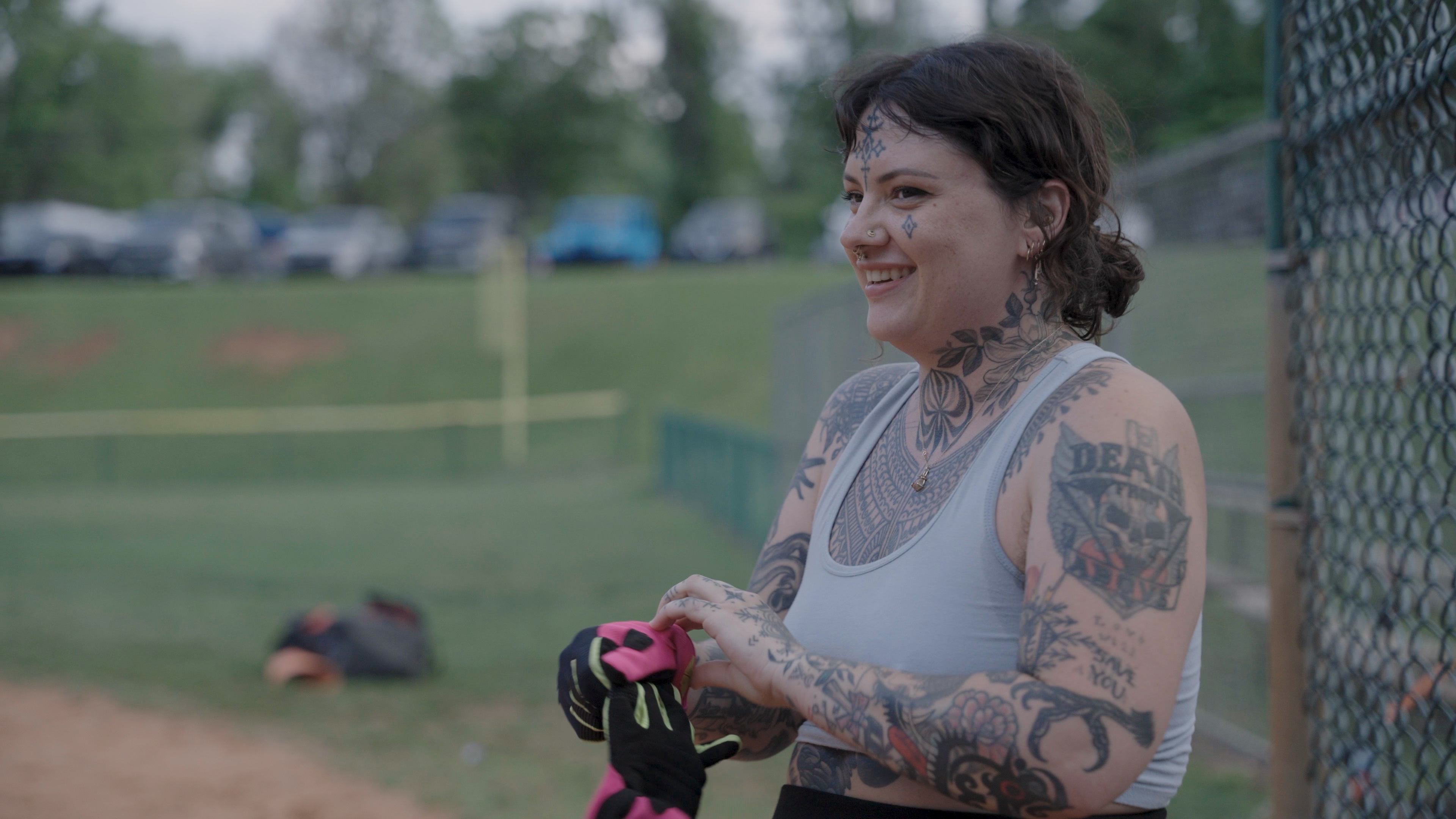 Baylen dons her baseball gloves before stepping up to bat during baseball practice in Asheville, North Carolina. The baseball team is a part of The Dock Ellis League, a punk baseball league named after Dock P. Ellis Jr., who pitched a no-hitter in 1970 while on LSD.