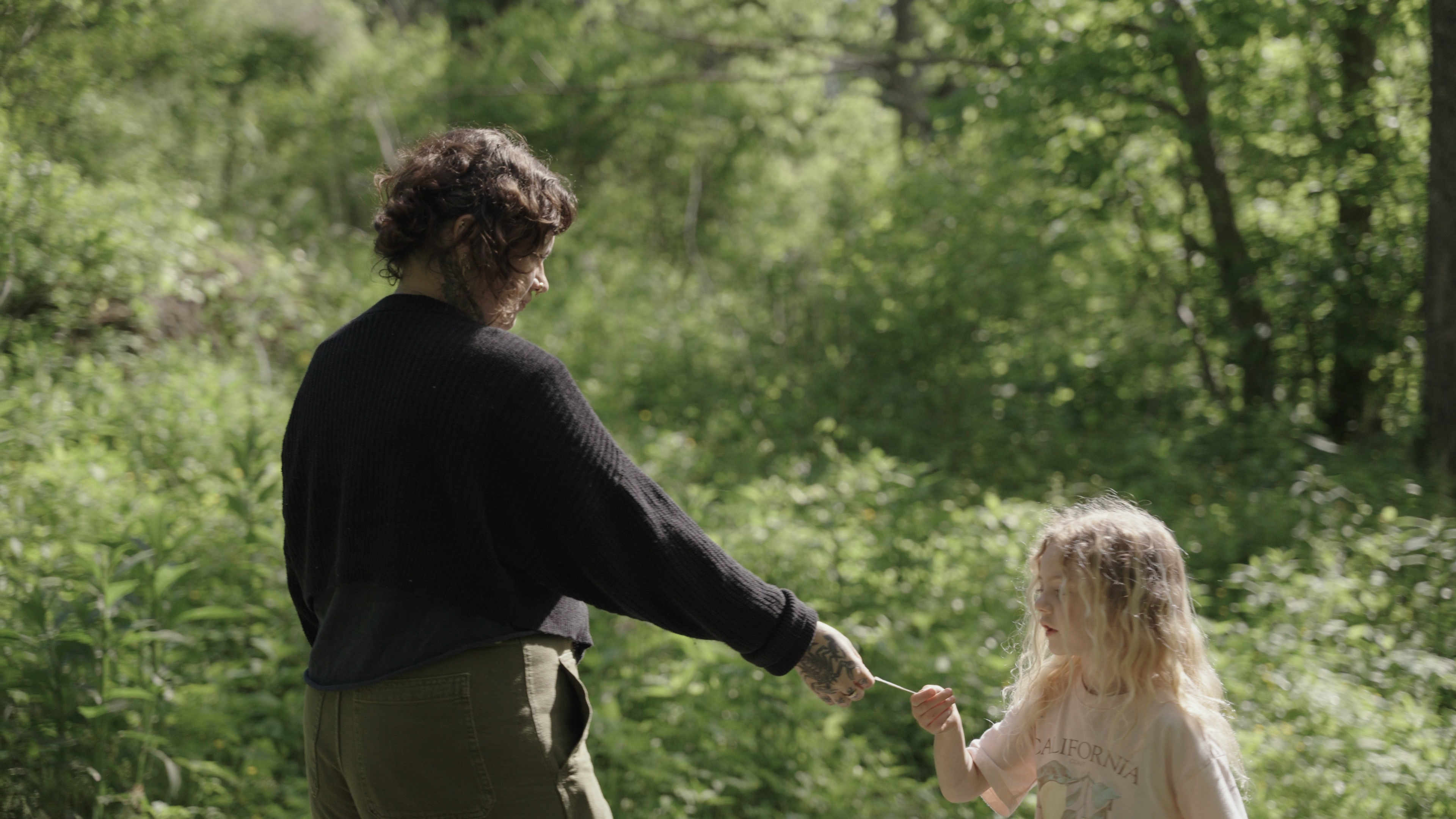 Baylen spends time with her daughter outside their home. “I have a beautiful life, I have an amazing family, and it’s been a product of intentional manifestation,” she said.